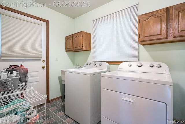 646 Alan Dr, Lake Orion, MI 48362 - laundry area with washer and clothes dryer and cabinet space