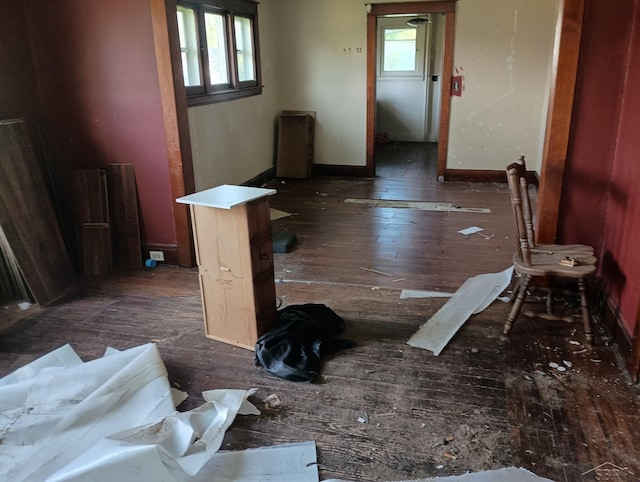 1507 Barnard St, Saginaw, MI 48602 - spare room with dark wood-style flooring and baseboards