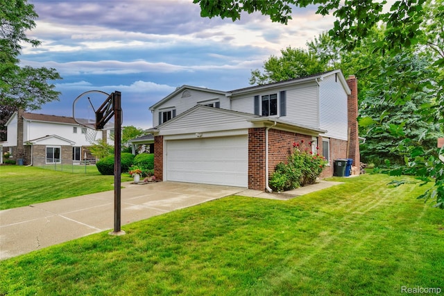 6848 Chadwick Dr, Canton, MI 48187 - traditional-style house with brick siding, a chimney, an attached garage, and driveway