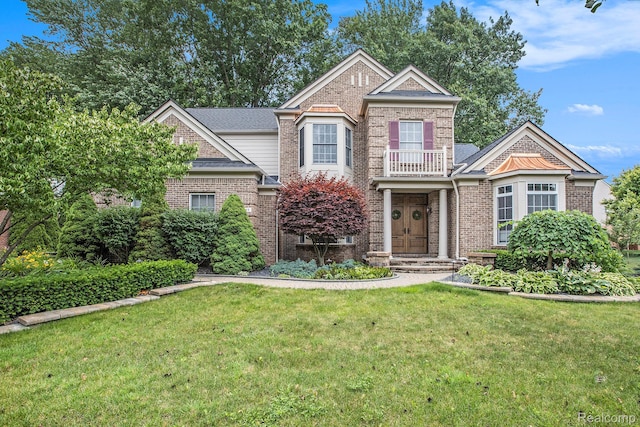 1249 Lasalle Rd, Canton, MI 48187 - georgian-style home with brick siding, a front yard, and a shingled roof