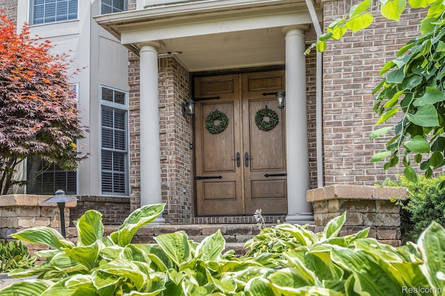 1249 Lasalle Rd, Canton, MI 48187 - view of exterior entry featuring brick siding