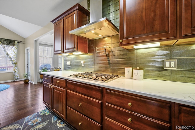 1249 Lasalle Rd, Canton, MI 48187 - kitchen featuring wall chimney range hood, dark brown cabinets, stainless steel gas cooktop, lofted ceiling, and dark wood-style floors