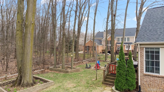 1249 Lasalle Rd, Canton, MI 48187 - view of grassy yard featuring a deck