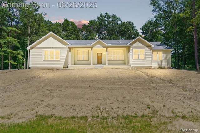 917 Chickasaw Dr, Mason, MI 48854 - ranch-style house featuring view of scattered trees