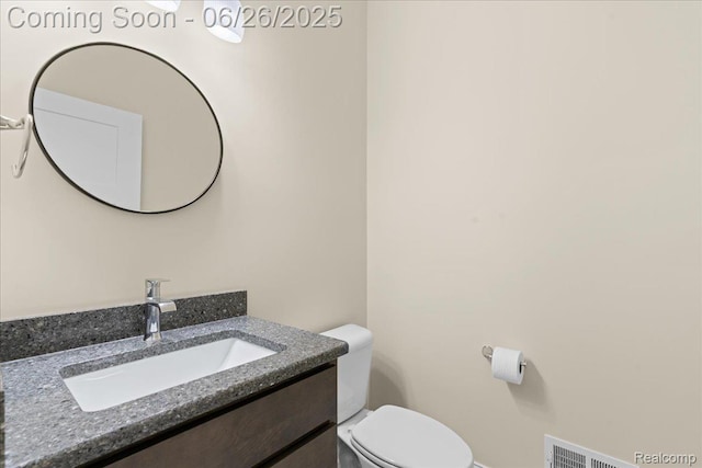 917 Chickasaw Dr, Mason, MI 48854 - bathroom with vanity and toilet