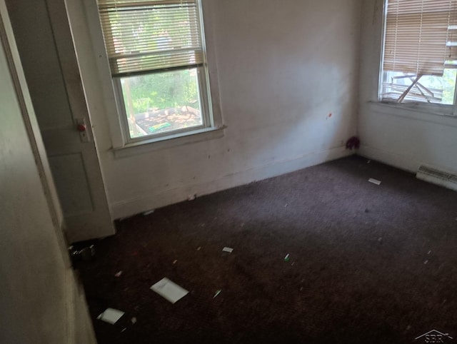 1907 N Clinton St, Saginaw, MI 48602 - unfurnished room with carpet floors and baseboards