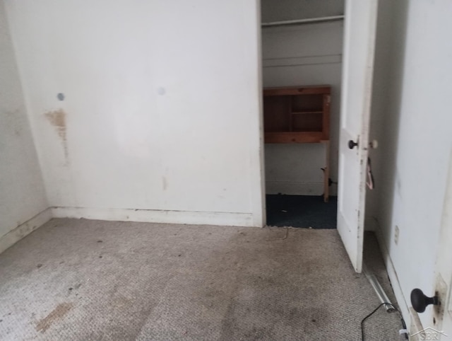 1907 N Clinton St, Saginaw, MI 48602 - unfurnished bedroom featuring carpet flooring and a closet