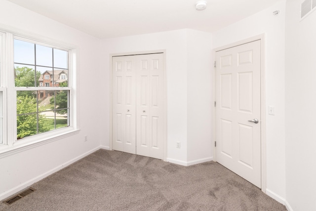 3046 Barclay Way, Ann Arbor, MI 48105 - unfurnished bedroom featuring carpet flooring and a closet
