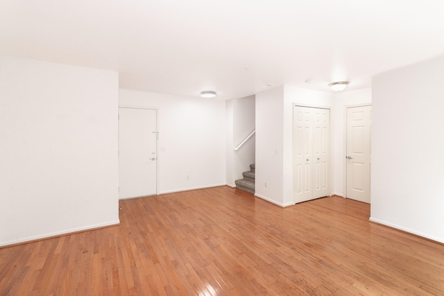 3046 Barclay Way, Ann Arbor, MI 48105 - unfurnished room featuring stairs and light wood-style floors