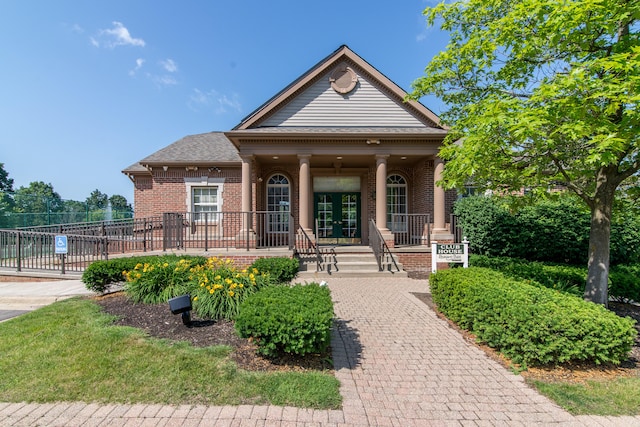 3046 Barclay Way, Ann Arbor, MI 48105 - neoclassical home featuring brick siding, a porch, and french doors