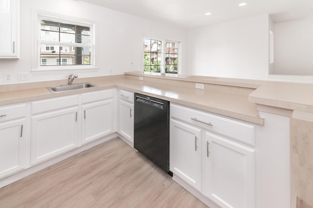 3046 Barclay Way, Ann Arbor, MI 48105 - kitchen with dishwasher, light wood-style flooring, recessed lighting, white cabinets, and light countertops