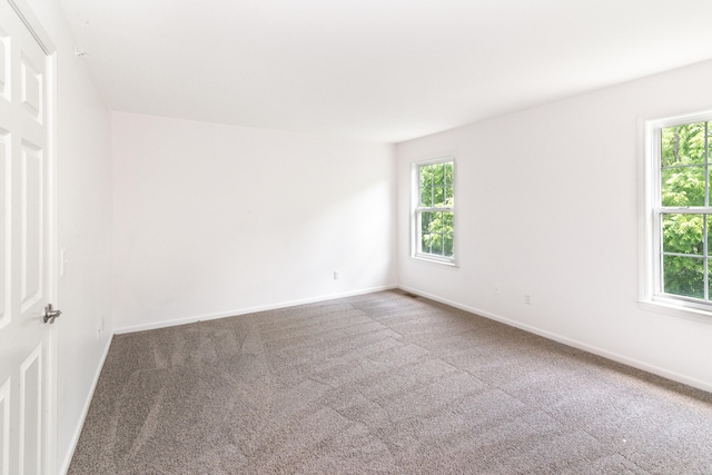 3046 Barclay Way, Ann Arbor, MI 48105 - carpeted empty room with healthy amount of natural light