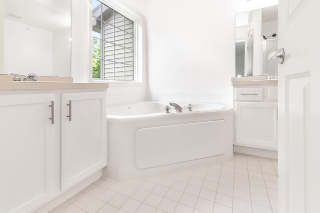3046 Barclay Way, Ann Arbor, MI 48105 - bathroom with vanity, tile patterned flooring, and a garden tub
