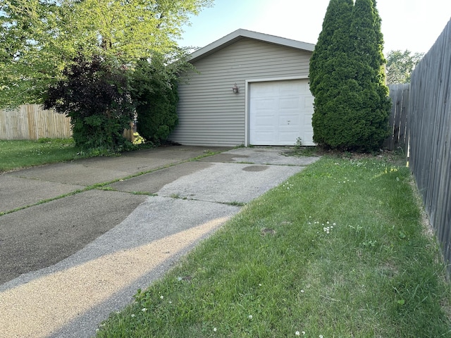 3704 Maybel St, Lansing, MI 48911 - detached garage featuring concrete driveway