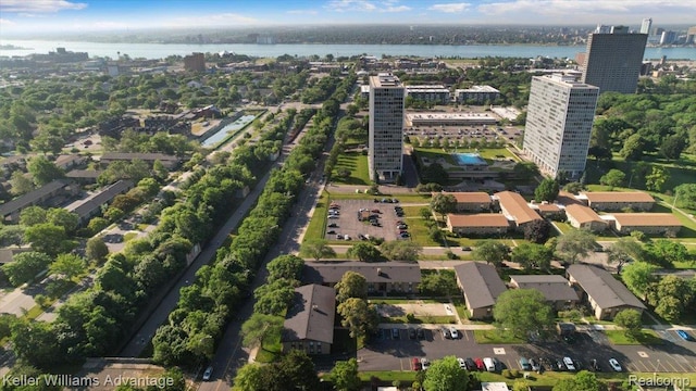 1565CHERBONEAU Cherboneau Pl Unit 52, Detroit, MI 48207 - aerial view of property and surrounding area with a nearby body of water