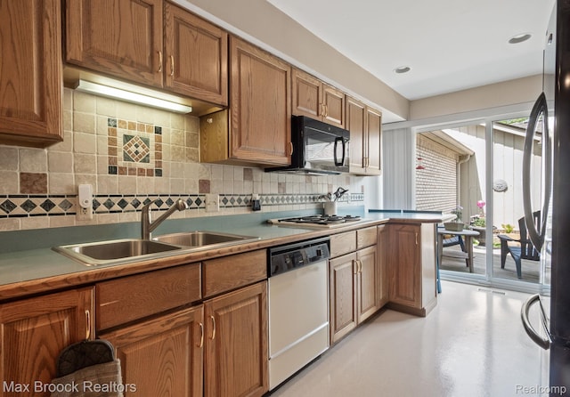 1122 Meadowglen Ct, Bloomfield Hills, MI 48304 - kitchen featuring white dishwasher, black microwave, tasteful backsplash, and brown cabinets