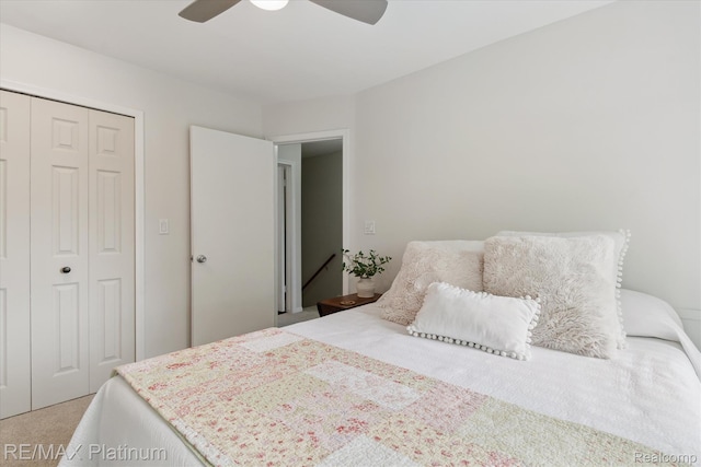 5959 Alan Dr Unit 53, Brighton, MI 48116 - bedroom with carpet floors, a closet, and ceiling fan