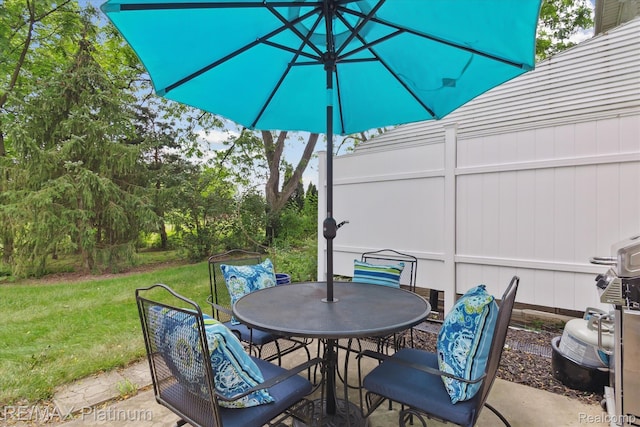 5959 Alan Dr Unit 53, Brighton, MI 48116 - view of patio / terrace with outdoor dining space