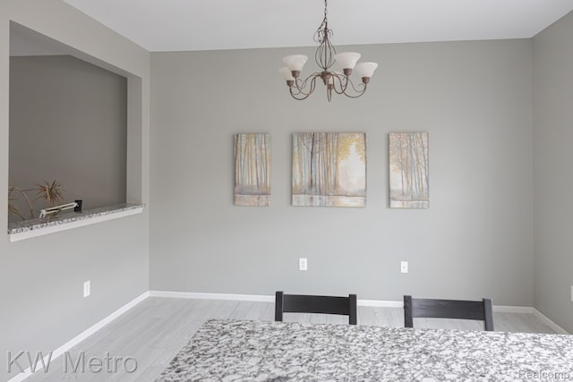 25493 Saint James, Southfield, MI 48075 - unfurnished dining area featuring light wood-type flooring and a chandelier