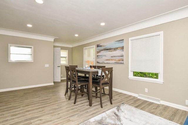 6604 E H Ave, Kalamazoo, MI 49048 - dining space with wood finished floors, ornamental molding, and recessed lighting