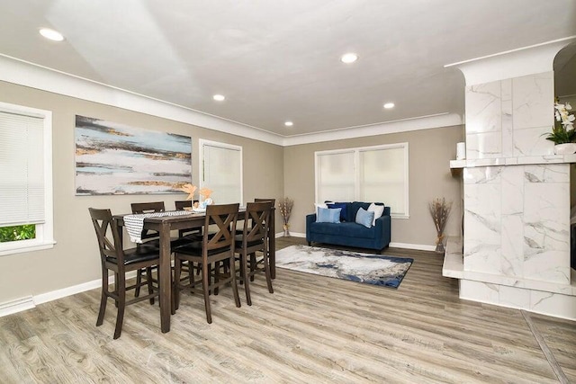 6604 E H Ave, Kalamazoo, MI 49048 - dining space with wood finished floors, recessed lighting, and crown molding