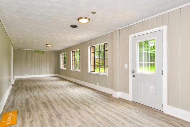 6604 E H Ave, Kalamazoo, MI 49048 - entrance foyer featuring wood finished floors and baseboards