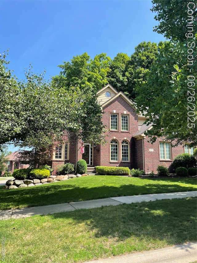 537 Bloomer Ridge Dr, Rochester, MI 48307 - view of front of home with brick siding and a front yard