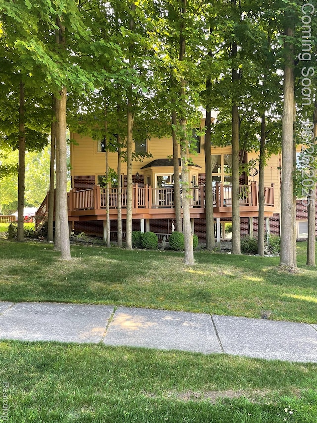 537 Bloomer Ridge Dr, Rochester, MI 48307 - view of home's community with a wooden deck and a yard