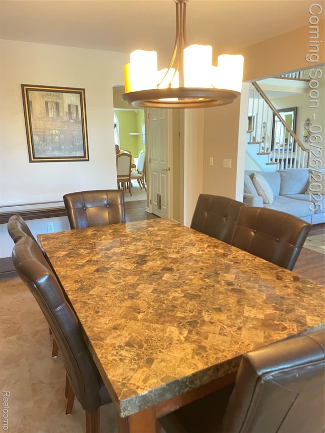 537 Bloomer Ridge Dr, Rochester, MI 48307 - dining area with stairs and a chandelier