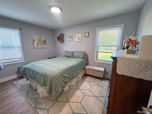 15684 Mcguire St, Taylor, MI 48180 - bedroom featuring light wood-type flooring and baseboards