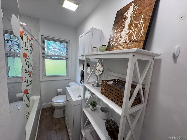 15684 Mcguire St, Taylor, MI 48180 - full bathroom with wood finished floors and shower / bath combination with curtain