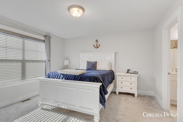 605 Bedford Falls Dr, Sparta, MI 49345 - bedroom with light carpet and baseboards