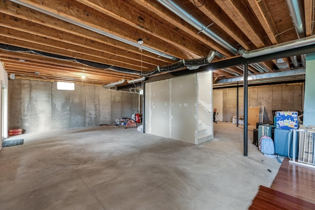 2385 Yasmin Dr, Michigan, MI 48382 - unfinished below grade area featuring stairs