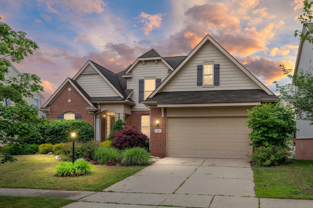 2385 Yasmin Dr, Michigan, MI 48382 - view of front facade with brick siding, driveway, a yard, and a garage