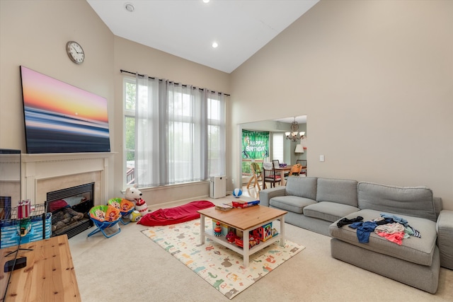 2385 Yasmin Dr, Michigan, MI 48382 - carpeted living area with high vaulted ceiling, a chandelier, a fireplace, and recessed lighting