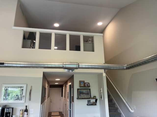 686 Terrace Point Dr Unit 22, Muskegon, MI 49440 - stairs with a high ceiling and recessed lighting