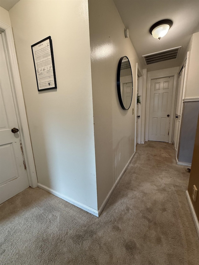 808 Stevens Dr, Owosso, MI 48867 - corridor featuring light carpet