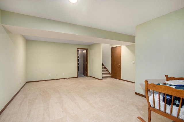 1067 Aspen Dr, Norton Shores, MI 49441 - finished below grade area with stairway and light carpet