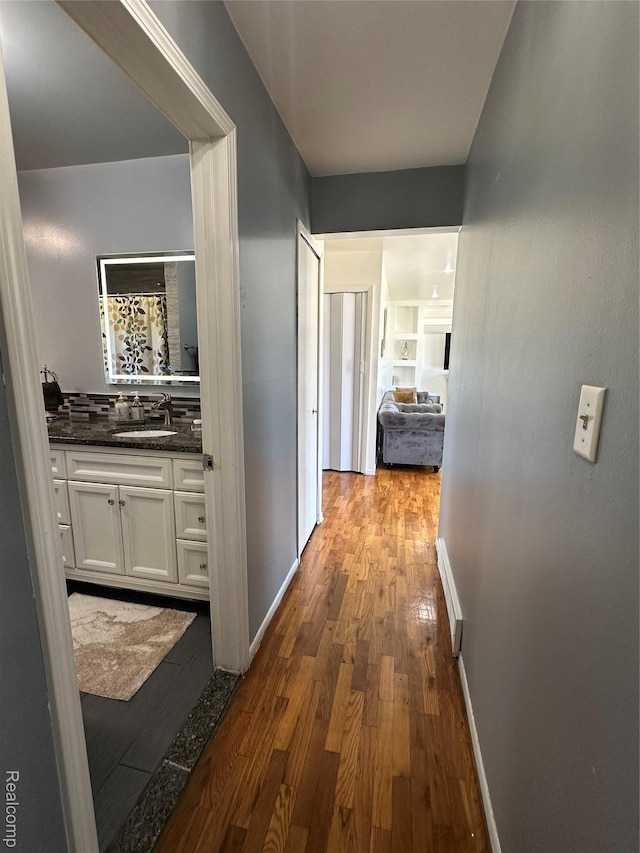 32302 Ryan Rd, Warren, MI 48092 - corridor with dark wood-style flooring