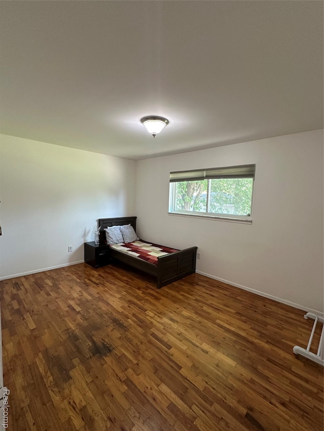 32302 Ryan Rd, Warren, MI 48092 - bedroom featuring dark wood-style floors