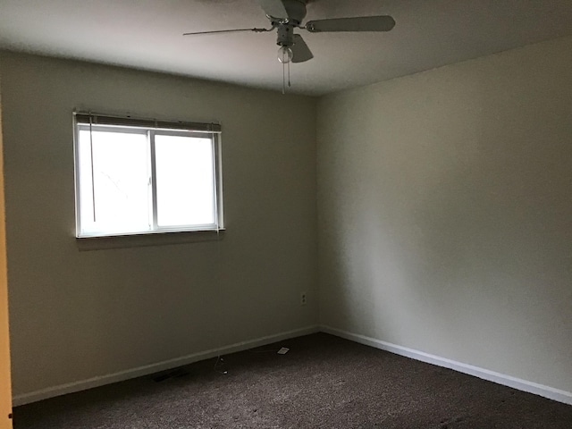 20072 Woodburn, Southfield, MI 48075 - unfurnished room featuring a ceiling fan and dark carpet