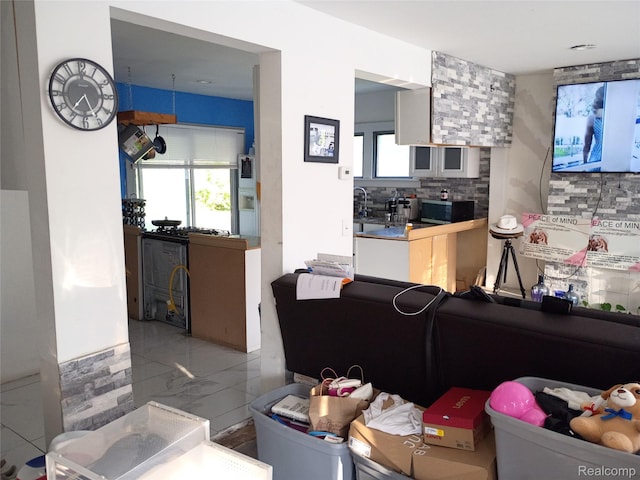 9360 Cheyenne St, Detroit, MI 48228 - living area featuring healthy amount of natural light and marble finish floors