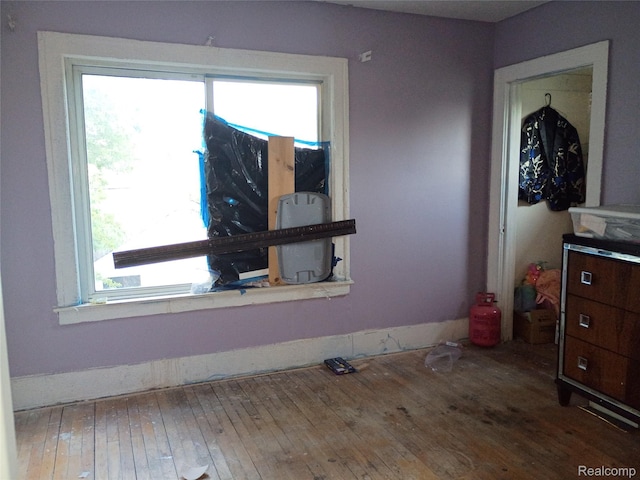 9360 Cheyenne St, Detroit, MI 48228 - unfurnished room featuring healthy amount of natural light and hardwood / wood-style flooring