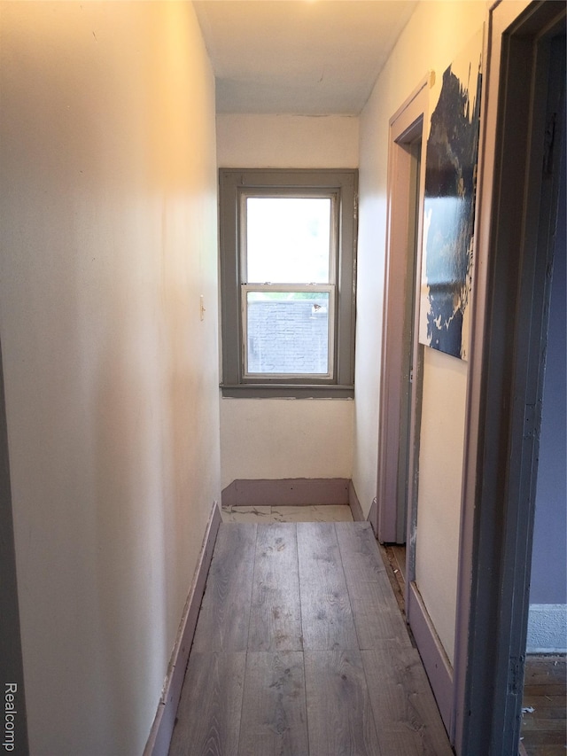 9360 Cheyenne St, Detroit, MI 48228 - hallway with baseboards and wood finished floors