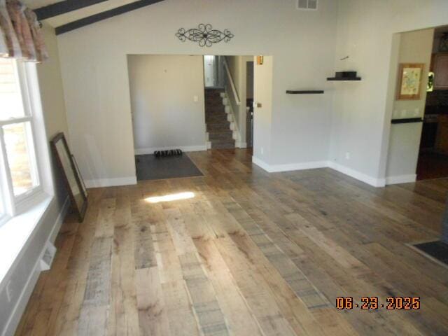 1090 Cadet Ln, Kalamazoo, MI 49009 - unfurnished room featuring stairs and wood finished floors