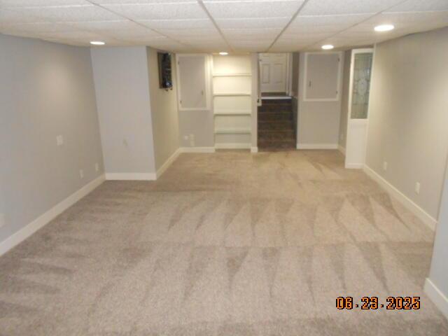 1090 Cadet Ln, Kalamazoo, MI 49009 - finished below grade area with light colored carpet and stairs