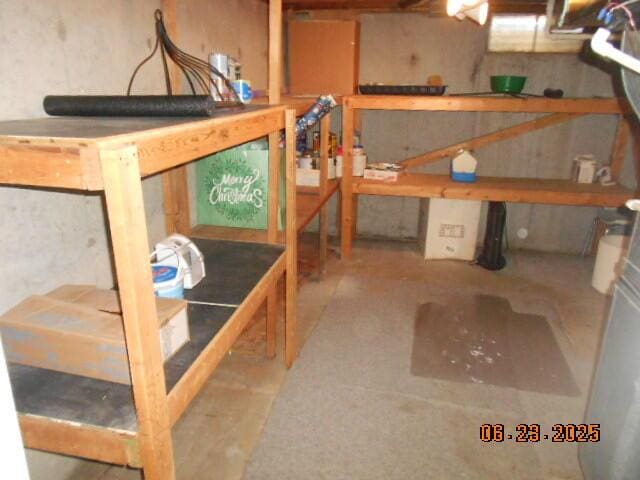 1090 Cadet Ln, Kalamazoo, MI 49009 - unfinished below grade area featuring a workshop area