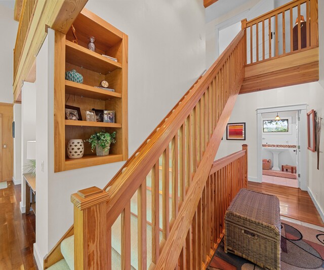 928 Curtis Rd, Quincy, MI 49082 - stairs featuring wood finished floors