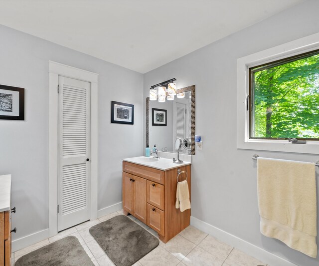 928 Curtis Rd, Quincy, MI 49082 - bathroom featuring vanity and tile patterned flooring