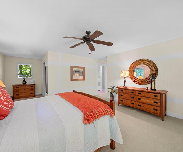 928 Curtis Rd, Quincy, MI 49082 - bedroom with ceiling fan and light carpet